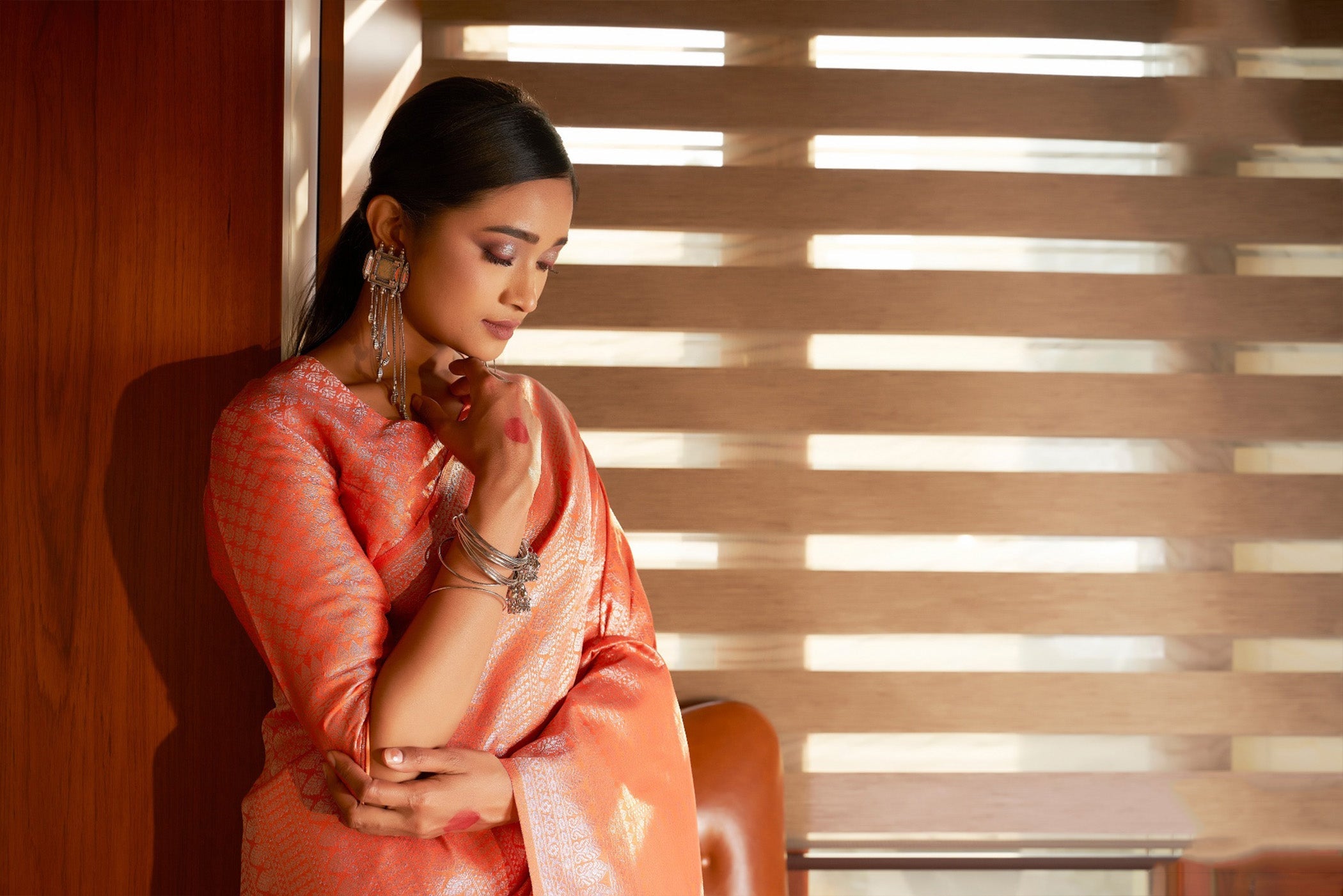 Elegant Orange Kanjivaram Silk Saree with Heavy Wevon Self Designer Work