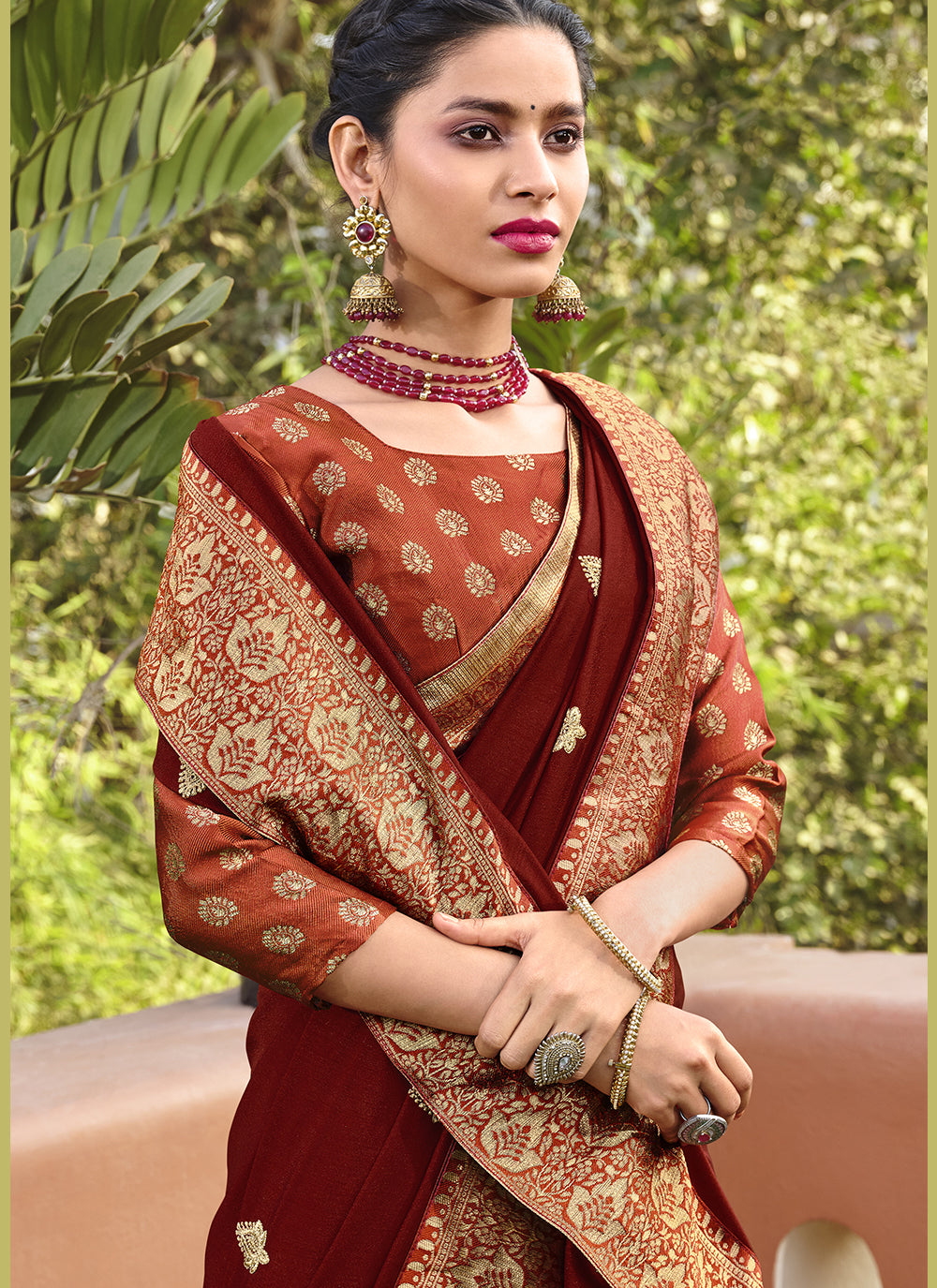 Maroon Silk Blend Saree with Embroidered Wevon Border & Rust Blouse