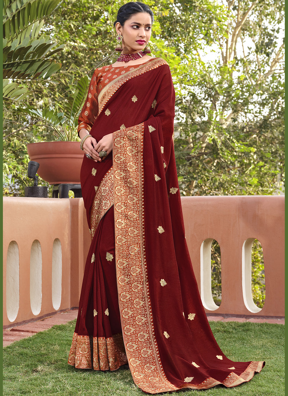 Maroon Silk Blend Saree with Embroidered Wevon Border & Rust Blouse