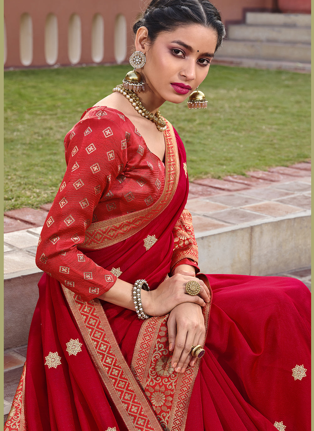 Red Silk Blend Saree with Golden Embroidery and Wevon Border Blouse