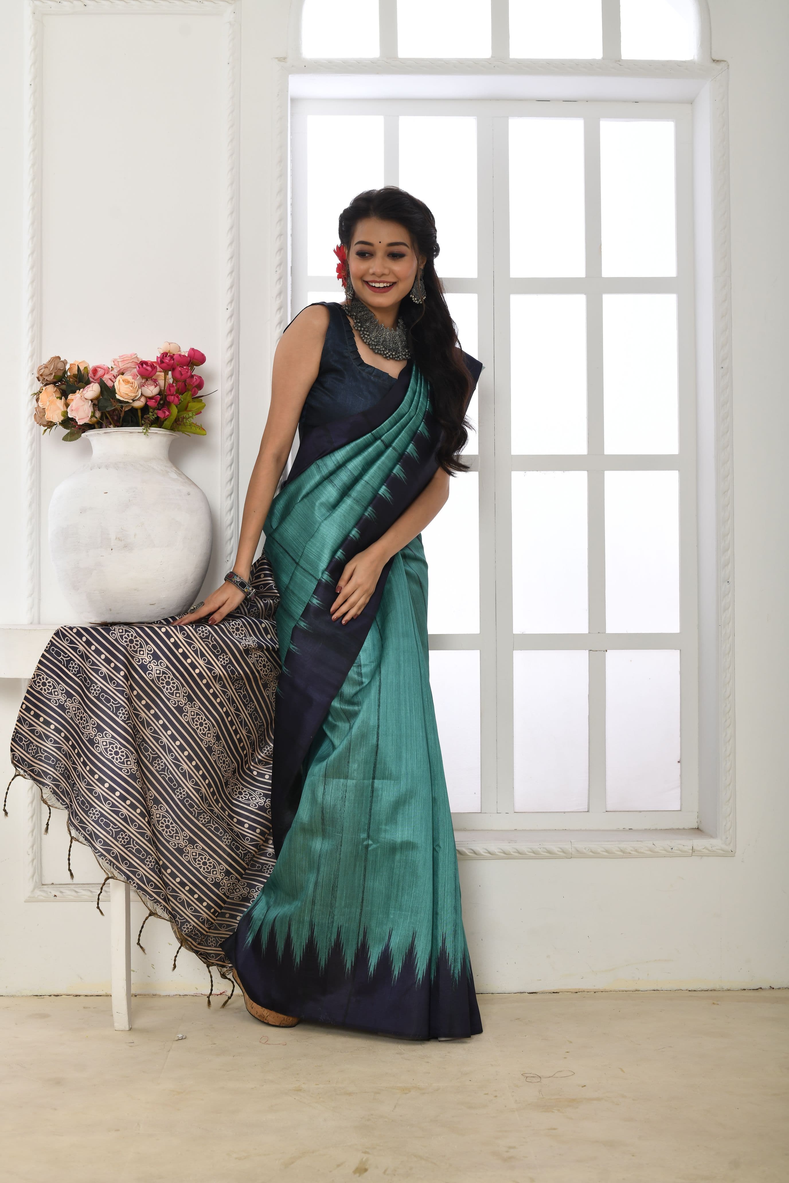 Teal Muse Soft Tussar Silk Saree with Printed Pallu & Temple Border